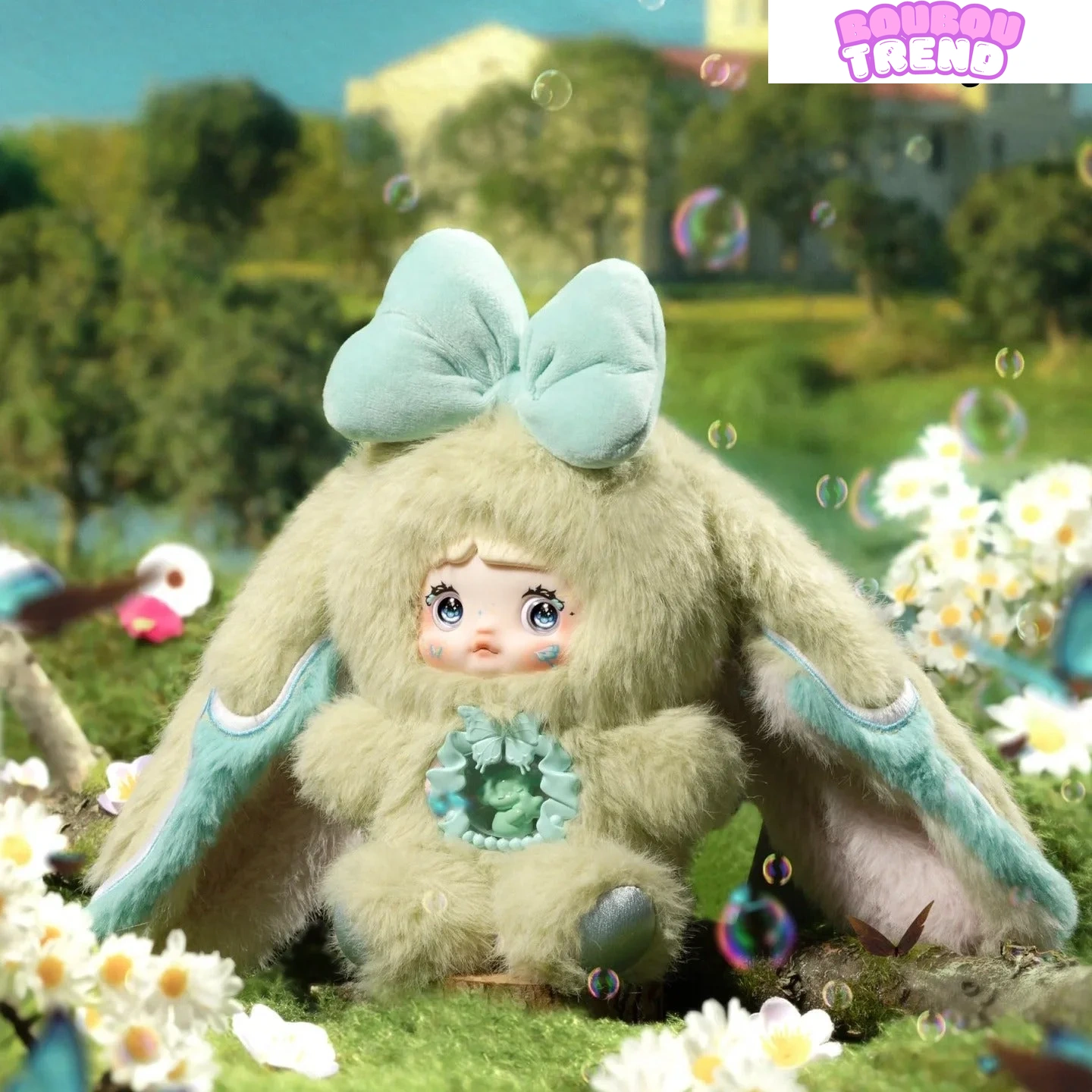 Poupée en peluche Nommi