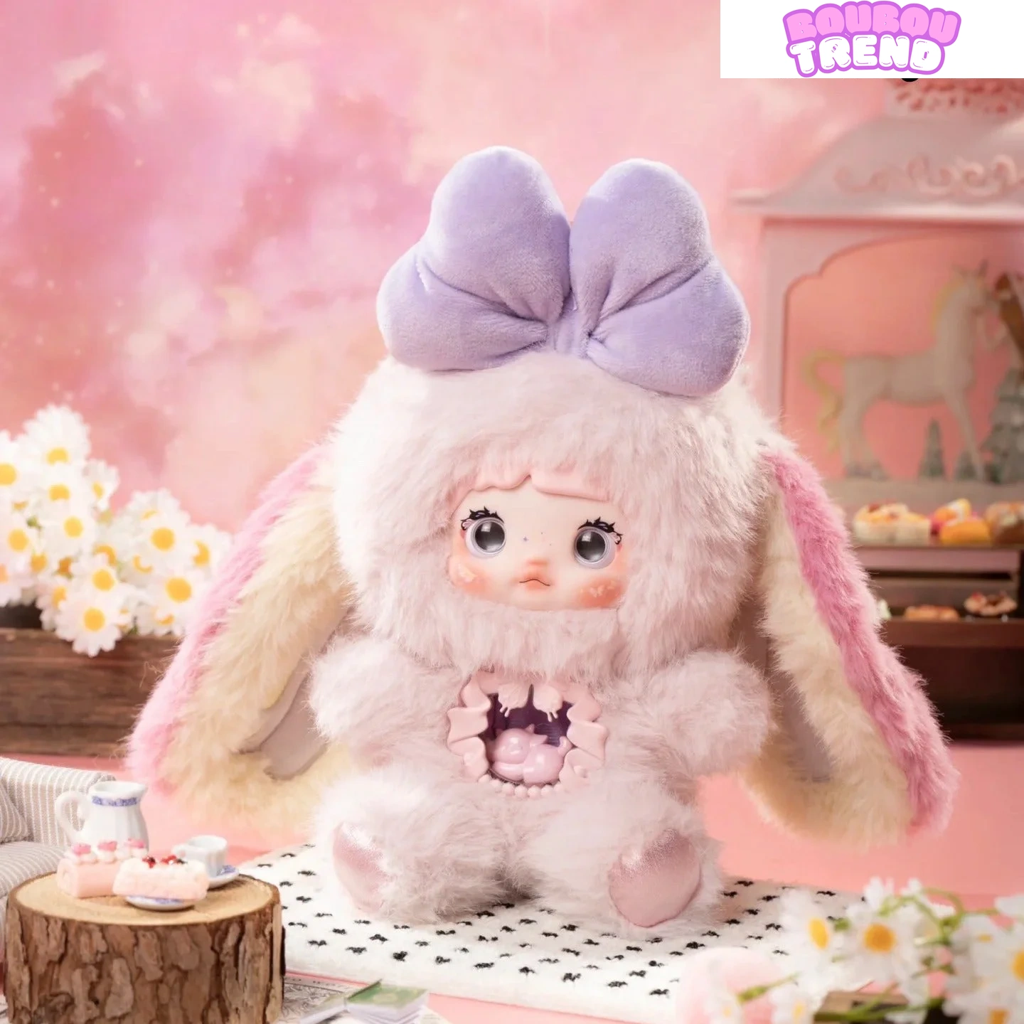 Poupée en peluche Nommi