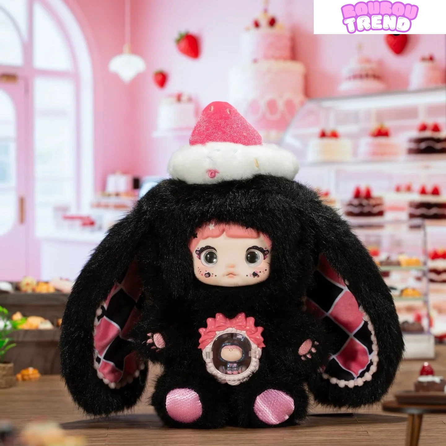 Poupée en peluche Nommi