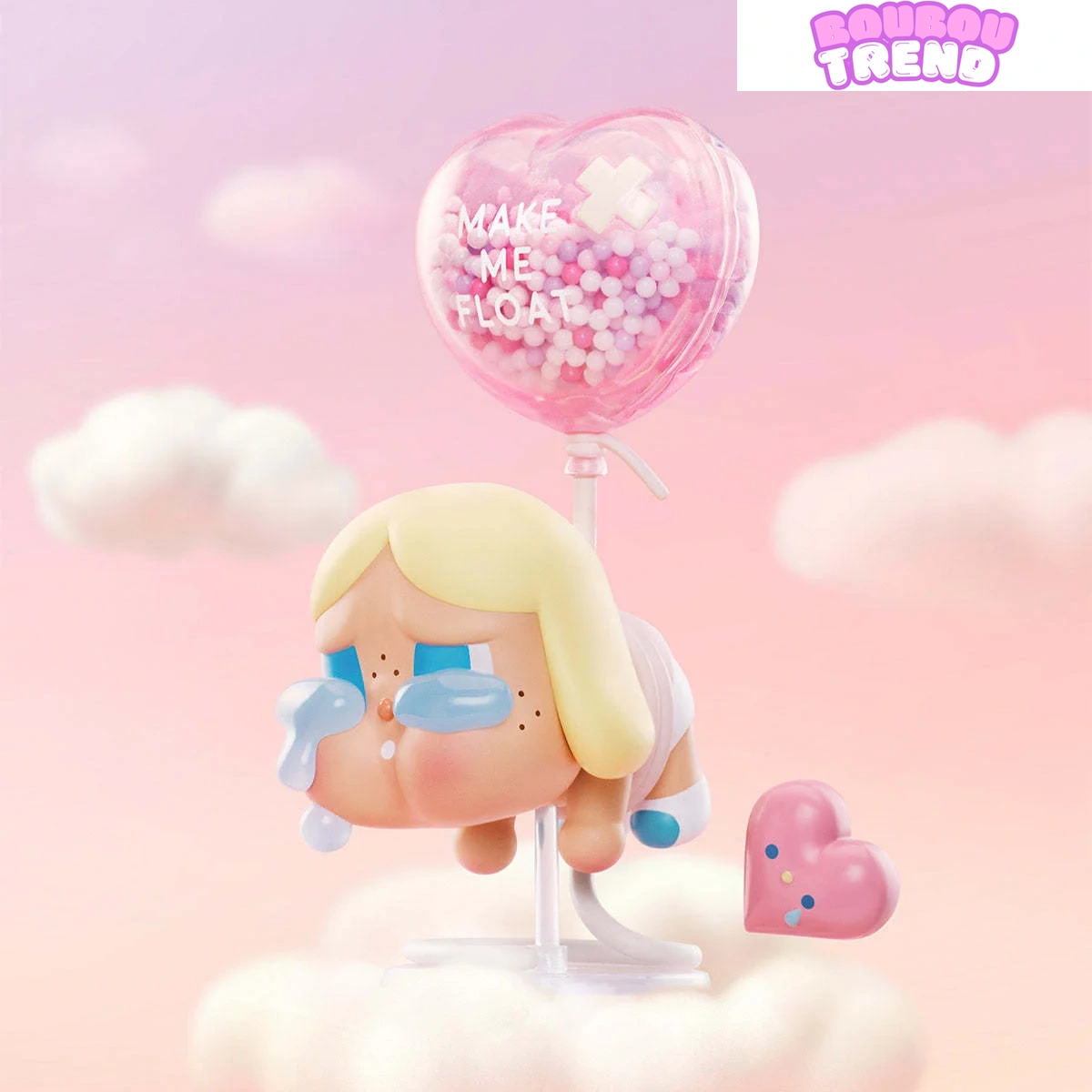 Figurine Crybaby sur un fond coloré
