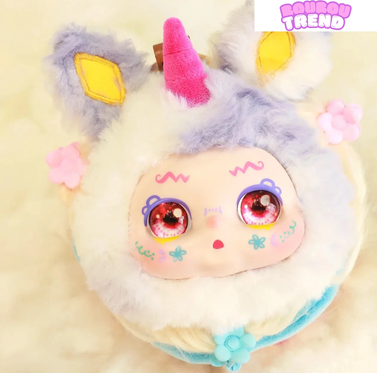 Poupée en peluche Kimmon