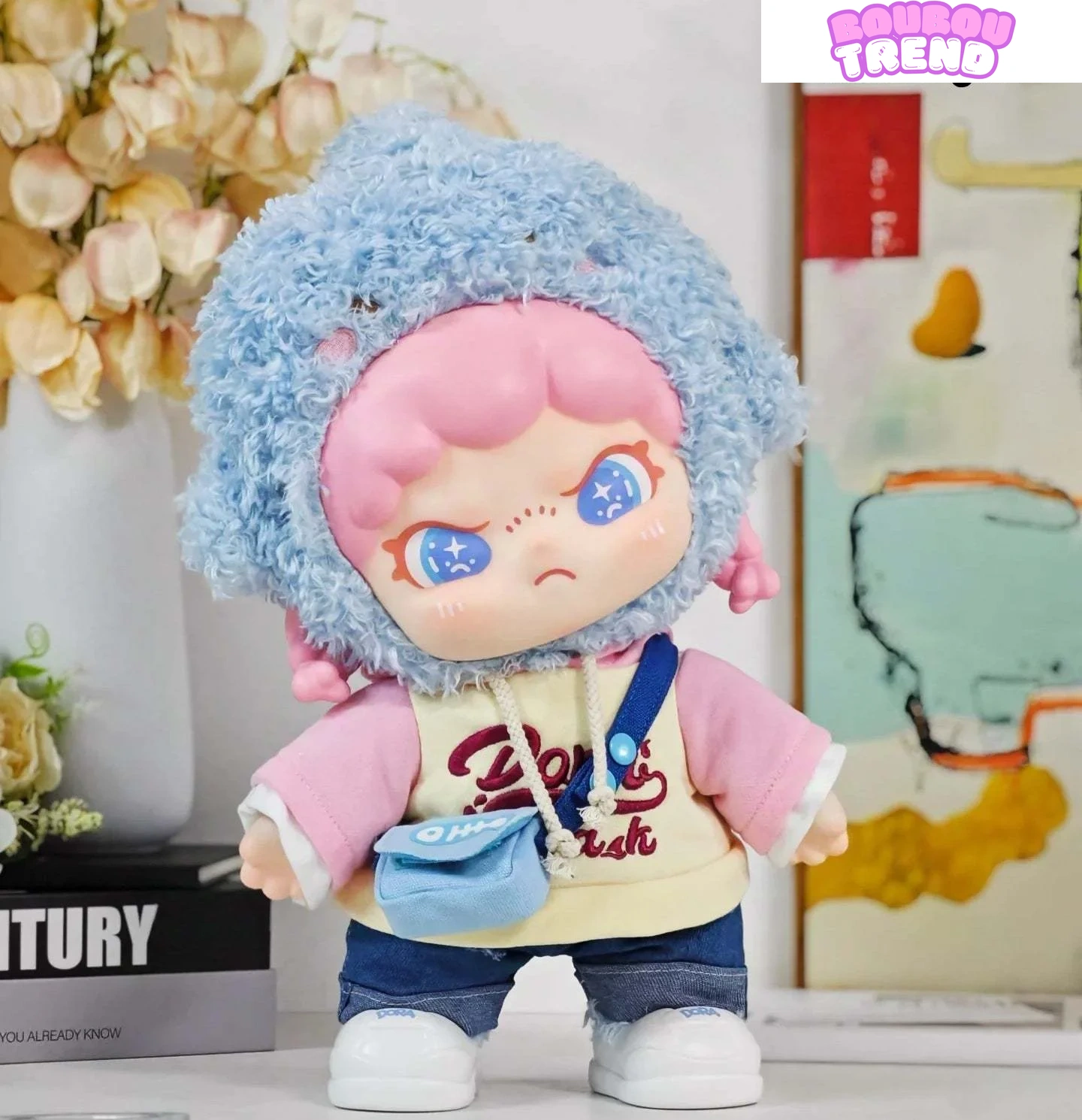 Détails de la poupée en vinyle peluche